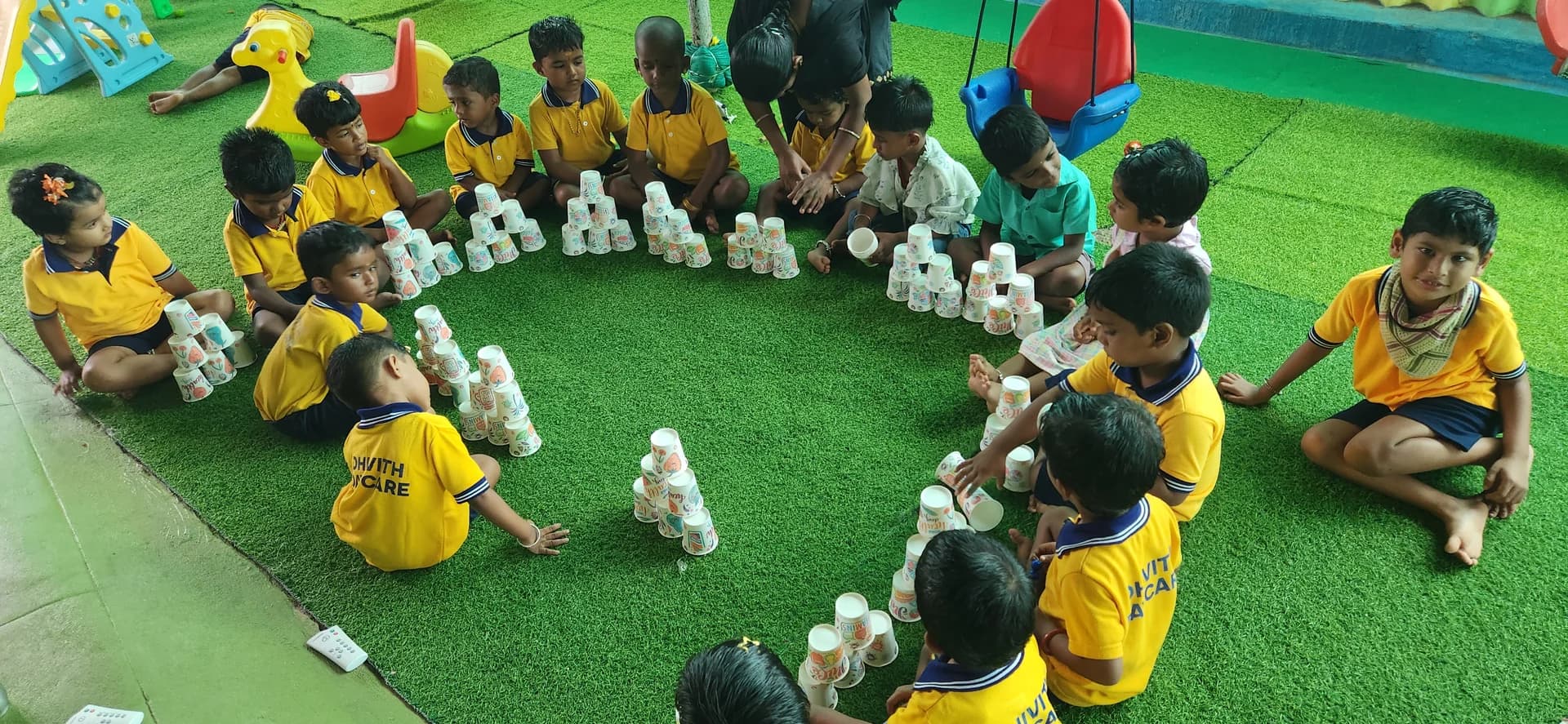 Paper Cup Pyramid Stacking Activity - Dhivith Edu Care Montessori School Kinathukadavu Coimbatore